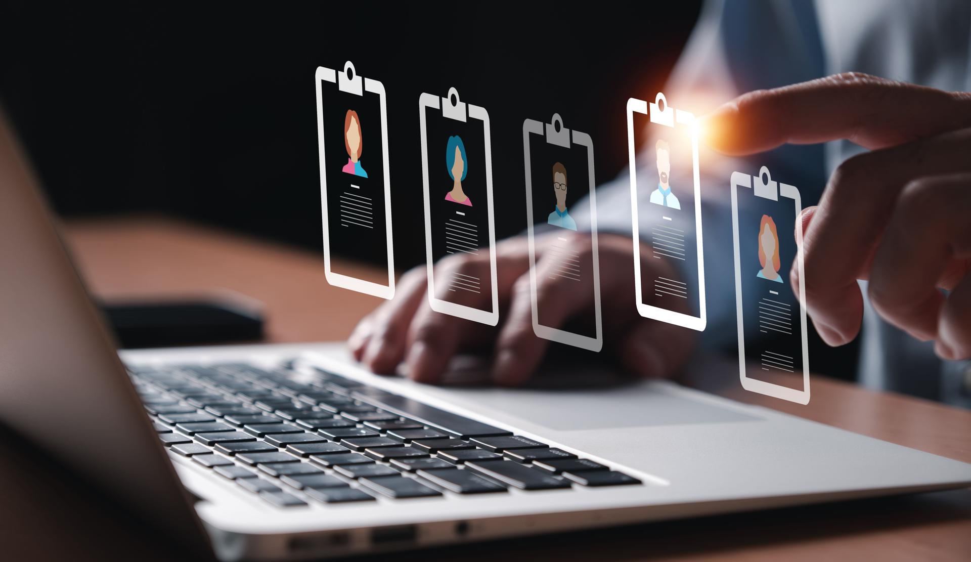 Entrepreneur using electronic devices for store customer data to gain customer insight in order to create marketing campaign that can help to increase sale and identify potential customer.